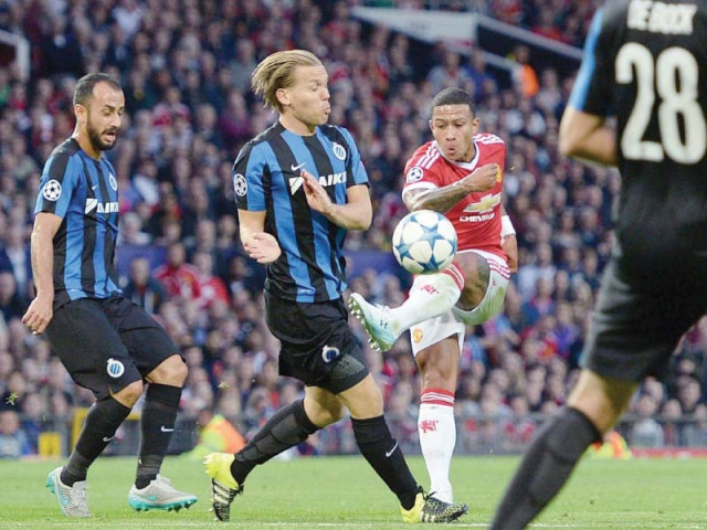25 million signing memphis depay announced himself to old trafford with two stylish goals as united came from behind to beat club brugge 3 1 in the champions league play off first leg photo afp 25 million signing memphis depay announced himself to old trafford with two stylish goals as united came from behind to beat club brugge 3 1 in the champions league play off first leg photo afp