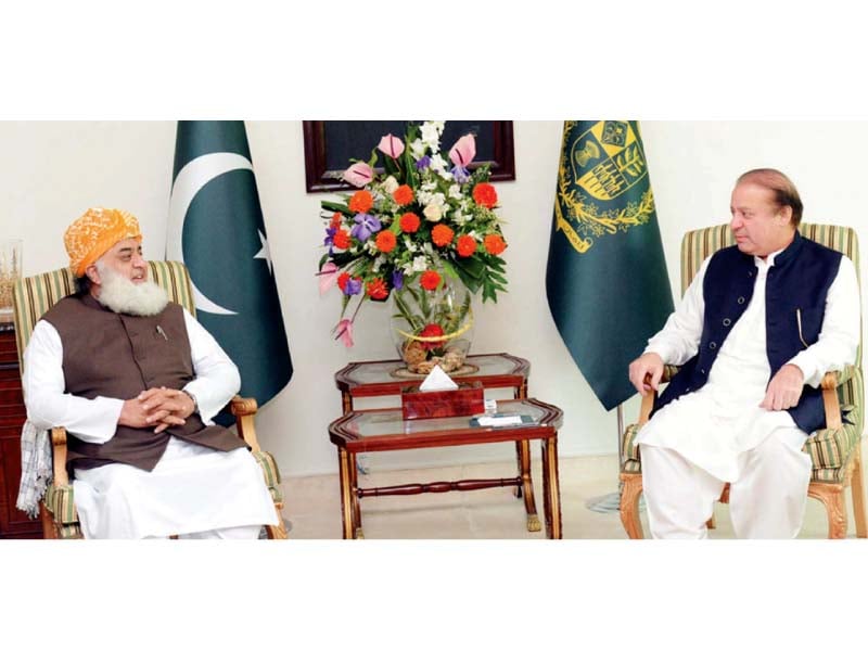 prime minister nawaz sharif and jui f chief maulana fazlur rehman talk during their meeting on wednesday photo inp