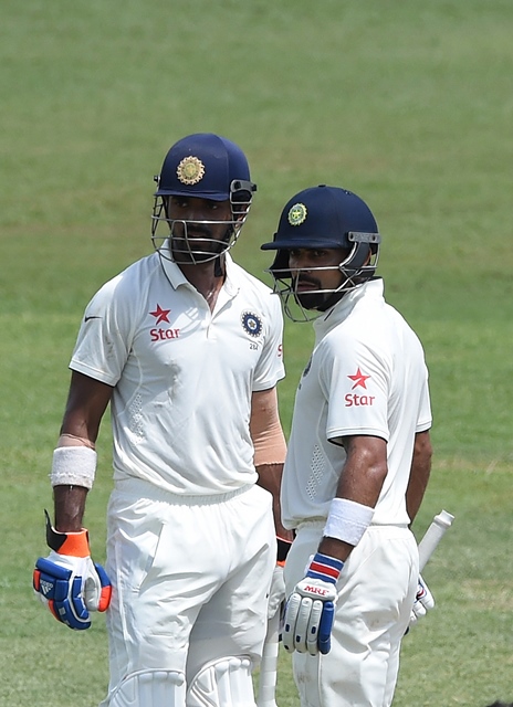 indian cricket team captain virat kohli r and lokesh rahul talk during the opening day of their second test match between sri lanka and india photo afp