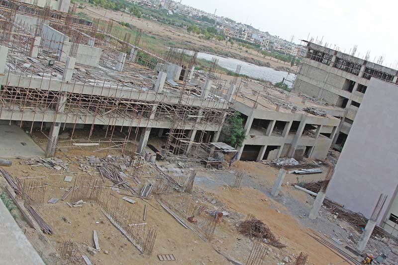 the 400 bed hospital being built in gulshan e iqbal is likely to be completed by next year the health minister has resolved to hasten up its construction to allow the residents of the area to avail the facilities soon photo aysha saleem express