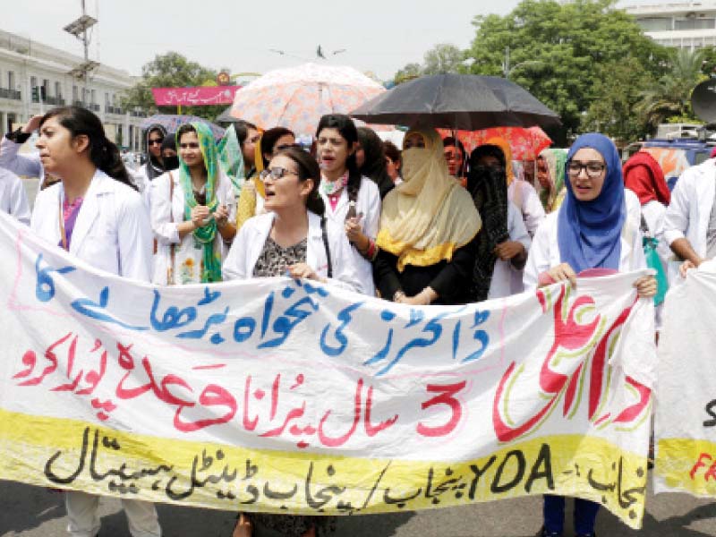 doctors of the punjab dental hospital protesting on the mall on thursday photo shafiq malik express