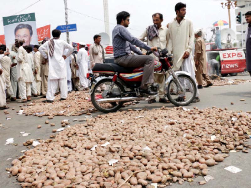 protesters spread potatoes on the mall and blocked it for traffic on friday photo shafiq malik express