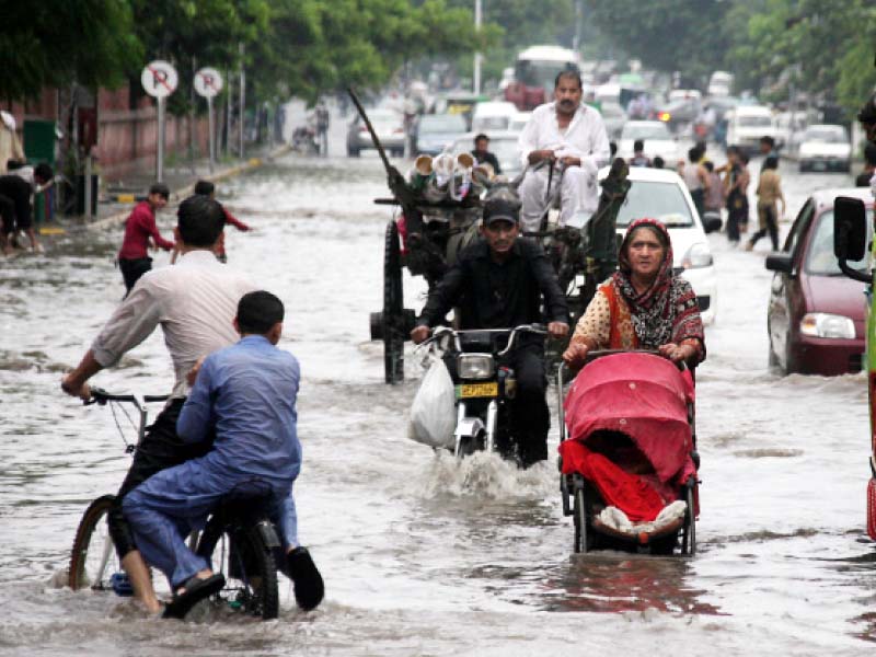 road in front of the supreme court registry flooded with rain water on friday photo abid nawaz express