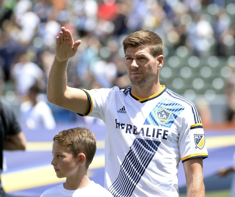 steven gerrard pictured warned frank lampard to be ready for quot war quot as the two former liverpool and chelsea midfield adversaries prepared to lock horns once more for their major league soccer sides photo afp