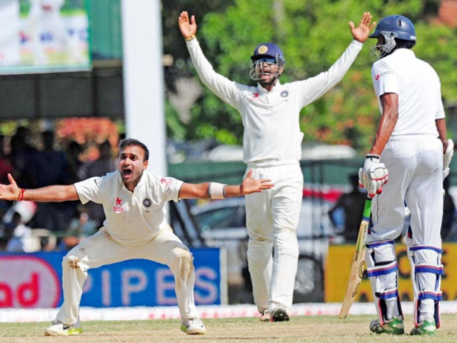 leg spinner amit mishra finished with four wickets while seamers ishant sharma and ashwin claimed two each photo afp leg spinner amit mishra finished with four wickets while seamers ishant sharma and ashwin claimed two each photo afp