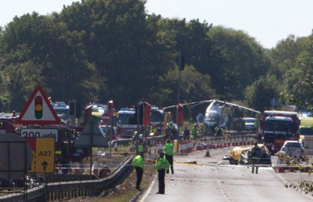 police and members of the emergency services work at the scene of a plane crash at shoreham airshow in shoreham by sea england on august 22 2015 photo afp police and members of the emergency services work at the scene of a plane crash at shoreham airshow in shoreham by sea england on august 22 2015 photo afp