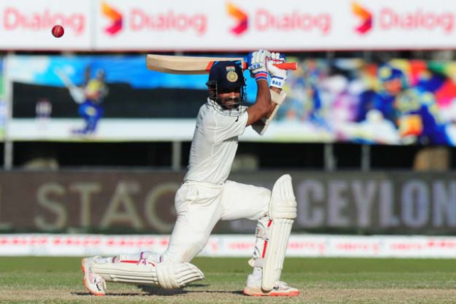 indian cricketer ajinkya rahane plays a shot during the third day of the second test cricket match between sri lanka and india at the p sara oval cricket stadium in colombo on august 22 2015 photo afp