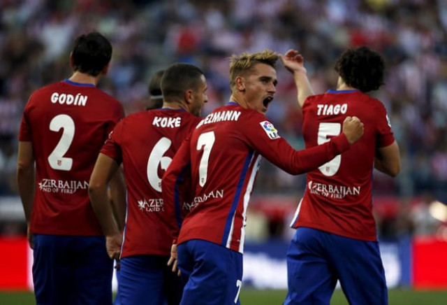 atletico madrid 039 s antoine griezmann celebrates with team mates after scoring a goal against las palmas during their spanish first division soccer match at vicente calderon stadium in madrid photo reuters atletico madrid 039 s antoine griezmann celebrates with team mates after scoring a goal against las palmas during their spanish first division soccer match at vicente calderon stadium in madrid photo reuters