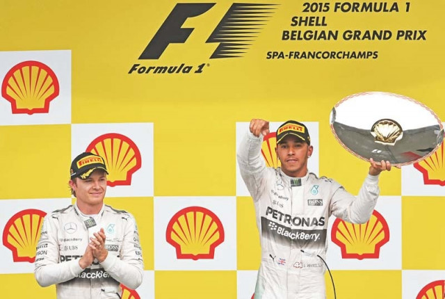 formula one world champion lewis hamilton won the belgian grand prix from pole position on sunday to stretch his lead over mercedes teammate nico rosberg to 28 points with eight races remaining photo afp formula one world champion lewis hamilton won the belgian grand prix from pole position on sunday to stretch his lead over mercedes teammate nico rosberg to 28 points with eight races remaining photo afp