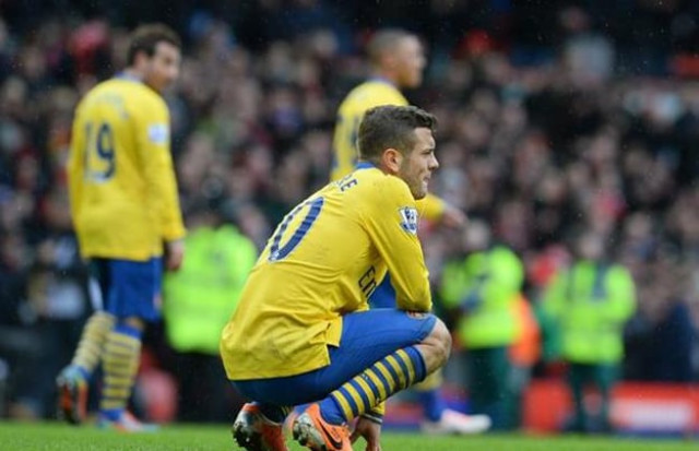 arsenal 039 s english midfielder jack wilshere reacts at the final whistle in the english premier league football match between liverpool and arsenal at anfield in liverpool photo afp arsenal 039 s english midfielder jack wilshere reacts at the final whistle in the english premier league football match between liverpool and arsenal at anfield in liverpool photo afp