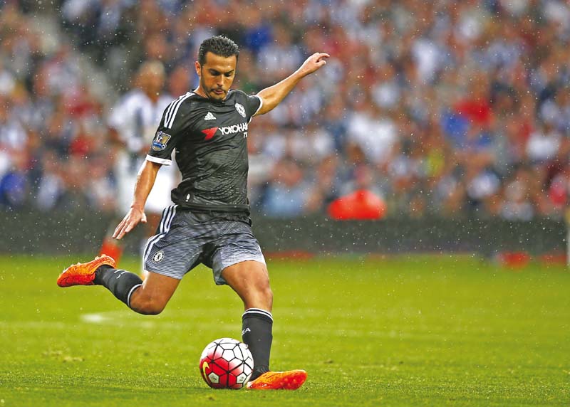 pedro scored a debut goal as champions chelsea got their stuttering premier league campaign off the ground with an entertaining 3 2 victory against west bromwich albion at the hawthorns on sunday photo afp