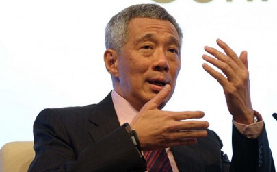 singapore pm defends immigration policy ahead of general election