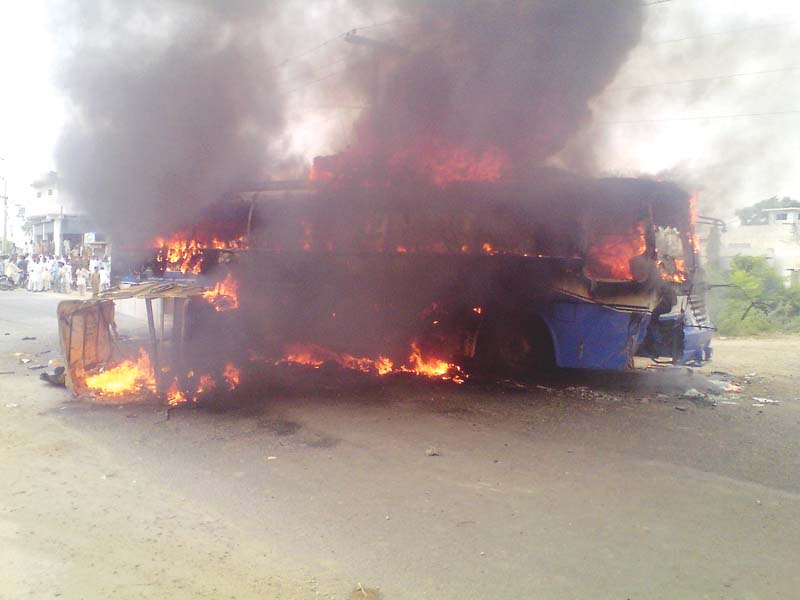 residents of the area set the bus on fire in protest saying 12 people had been killed on this spot in three weeks photo tariq ismaeel express