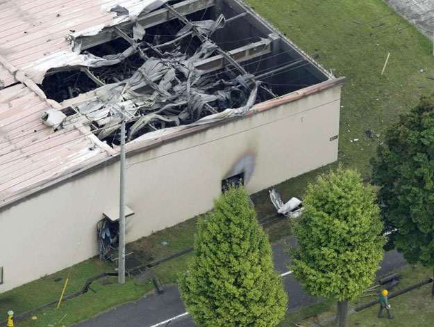 a warehouse which caught fire after an explosion is seen at the u s army sagami general depot in sagamihara southwest of tokyo japan in this aerial photo taken by kyodo august 24 2015 photo reuters