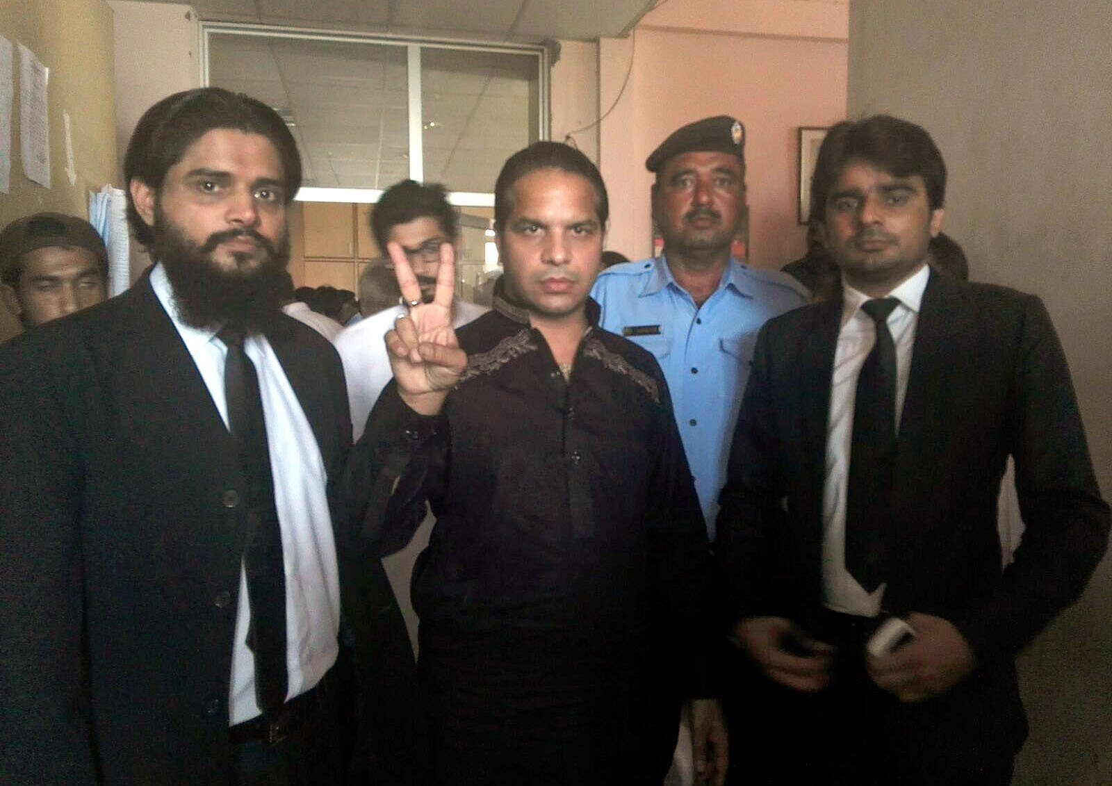 dj butt makes a victory sign after securing a pre arrest bail in islamabad on august 24 2015 photo waseem nazir express