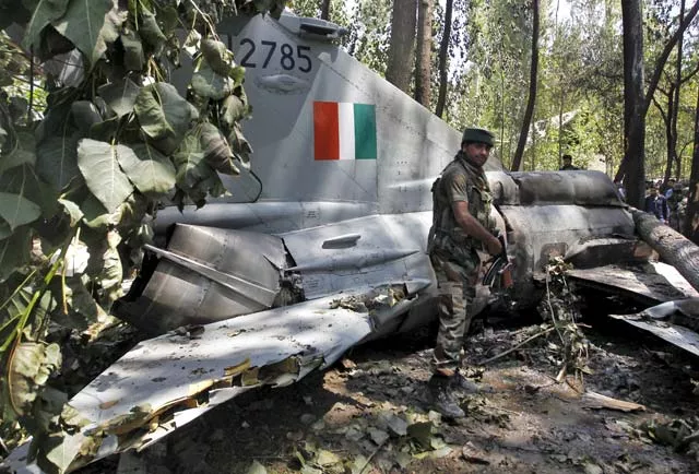 an indian army soldier stands in front of the wreckage of a mig 21 bison aircraft of the indian air force iaf after it crashed in soibugh in budgam district of kashmir august 24 2015 photo reuters an indian army soldier stands in front of the wreckage of a mig 21 bison aircraft of the indian air force iaf after it crashed in soibugh in budgam district of kashmir august 24 2015 photo reuters