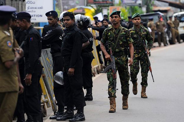 sri lankan law enforcement personnel on the eve of a general election in the country photo afp