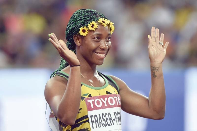 fraser pryce will now look to repeat the 100 200m sprint double she achieved in moscow two years ago photo afp