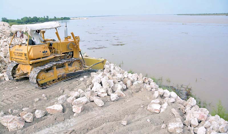 every high flood brings with it ample opportunities for the irrigation department officials to embezzle funds on the pretence of repairing protective embankments photo file