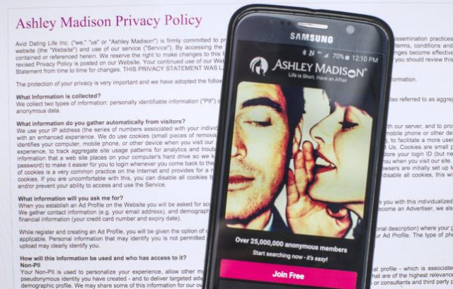 a photo illustration shows the privacy policy of the ashley madison website seen behind a smartphone running the ashley madison app in toronto august 20 2015 photo reuters a photo illustration shows the privacy policy of the ashley madison website seen behind a smartphone running the ashley madison app in toronto august 20 2015 photo reuters