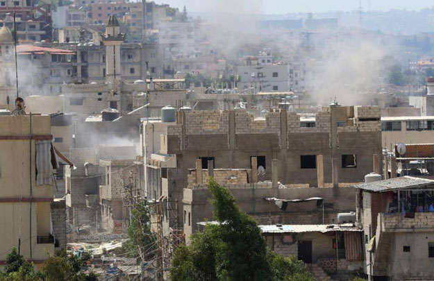 smoke billows in the ain el helweh palestinian refugee camp near sidon lebanon on august 23 2015 photo afp