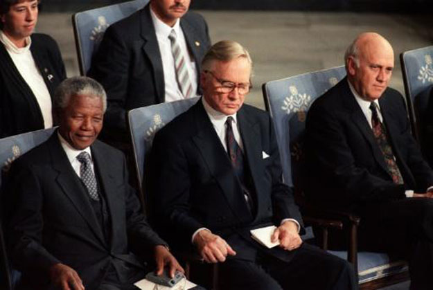 nelson mandela l nobel committee president dr francis sejersted c and then south african president frederik de klerk r attend the ceremony in december 1993 in oslo where both leaders received the 1993 nobel peace prize photo afp