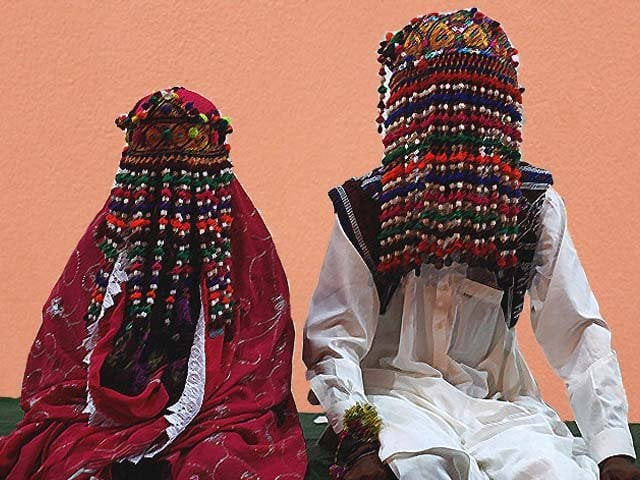 a bride and groom wait for their wedding to start during a mass marriage ceremony in karachi photo reuters a bride and groom wait for their wedding to start during a mass marriage ceremony in karachi photo reuters