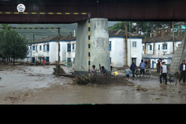 residents attempt to clear flood debris from under a bridge in the city of rajin in north korea in this august 22 2015 picture taken by a recent visitor heavy rain in north korea killed 40 people stranded thousands in flash floods and caused quot massive quot damage on the weekend the international federation of the red cross and north korean media said more than 11 000 people were forced from their homes or otherwise affected by the floods which hit the northeastern city of rajin near the border with russia and china on saturday and sunday hler gudjonsson a spokesman for the red cross in beijing told reuters reuters residents attempt to clear flood debris from under a bridge in the city of rajin in north korea in this august 22 2015 picture taken by a recent visitor heavy rain in north korea killed 40 people stranded thousands in flash floods and caused quot massive quot damage on the weekend the international federation of the red cross and north korean media said more than 11 000 people were forced from their homes or otherwise affected by the floods which hit the northeastern city of rajin near the border with russia and china on saturday and sunday hler gudjonsson a spokesman for the red cross in beijing told reuters reuters
