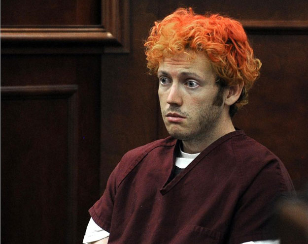 james holmes pictured on july 23 2012 was led out of a colorado courtroom in shackles to begin serving consecutive life sentences with no possibility of parole for the shooting deaths of 12 people in a packed movie premiere three years ago photo afp