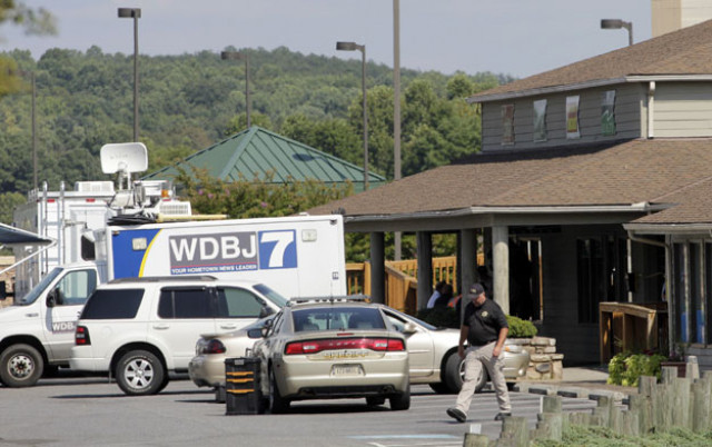 the tv truck that journalists alison parker and adam ward drove before they were killed this morning during a live broadcast sits in a parking lot near the scene on august 26 2015 in moneta virginia photo afp the tv truck that journalists alison parker and adam ward drove before they were killed this morning during a live broadcast sits in a parking lot near the scene on august 26 2015 in moneta virginia photo afp