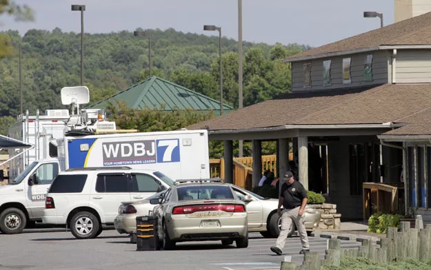 the tv truck that journalists alison parker and adam ward drove before they were killed this morning during a live broadcast sits in a parking lot near the scene on august 26 2015 in moneta virginia photo afp the tv truck that journalists alison parker and adam ward drove before they were killed this morning during a live broadcast sits in a parking lot near the scene on august 26 2015 in moneta virginia photo afp