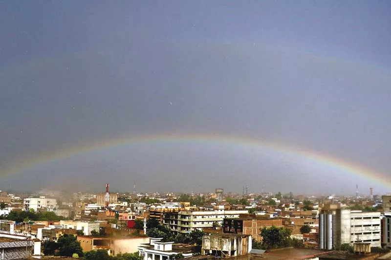 a rainbow appears after a heavy downpour in the city photo ppi a rainbow appears after a heavy downpour in the city photo ppi