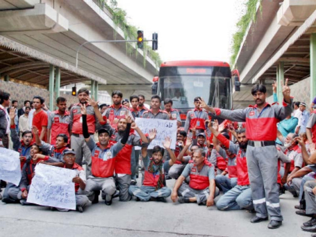 dozens of security workers blocked the metro track on thursday to demand payment of wages photo shahbaz malik express dozens of security workers blocked the metro track on thursday to demand payment of wages photo shahbaz malik express