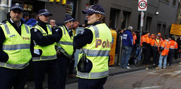 a crowd of several hundred protesters shut down a main intersection in the heart of melbourne while protesting over the visa checks photo afp