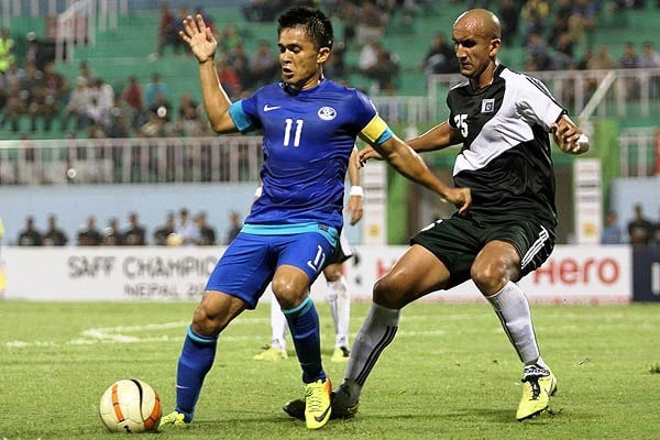 indian captain sunil chhetri is tackled by former english premier league player and current pakistan international zesh rehman r photo goalnepal com