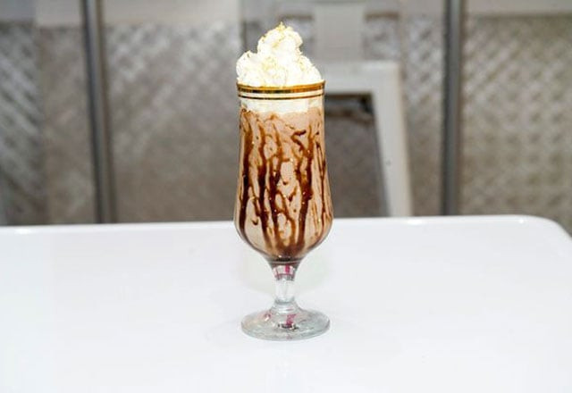 the milkshake is prepared with 22 carat edible gold syrup the milkshake is prepared with 22 carat edible gold syrup