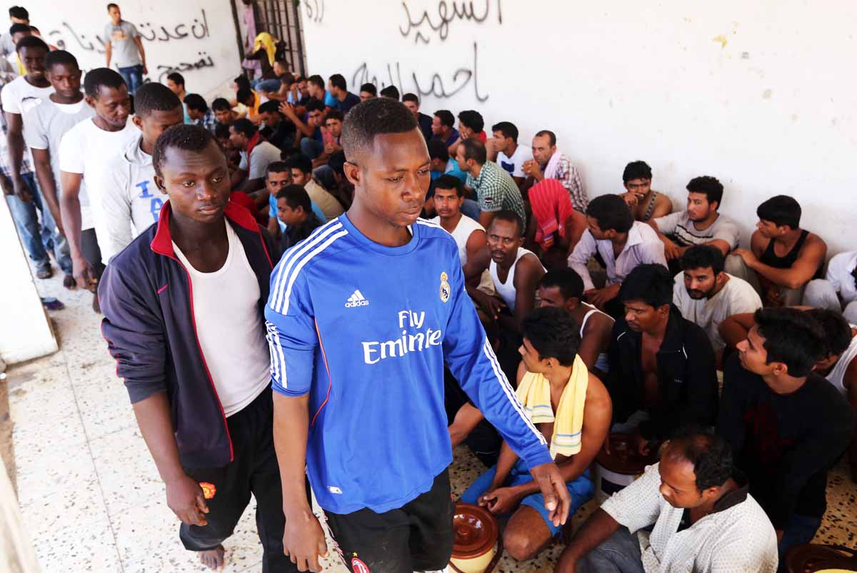 migrants rescued by the coast guard off the coast of libya when their boat sank photo afp