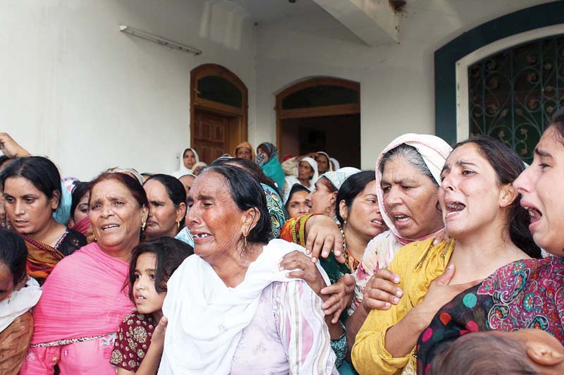 relatives mourn the killing of a family member in shelling by the indian forces in charwa sector photo online