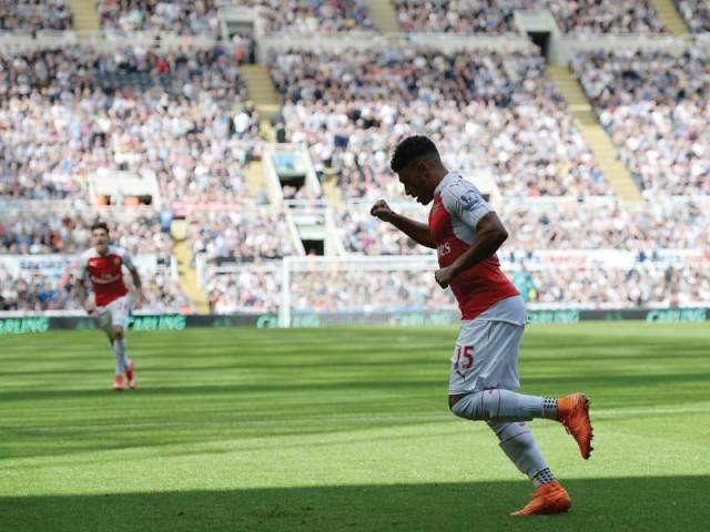 chamberlain peels away in celebration after his off target shot took a slight deflection off coloccini to sneak in photo afp chamberlain peels away in celebration after his off target shot took a slight deflection off coloccini to sneak in photo afp