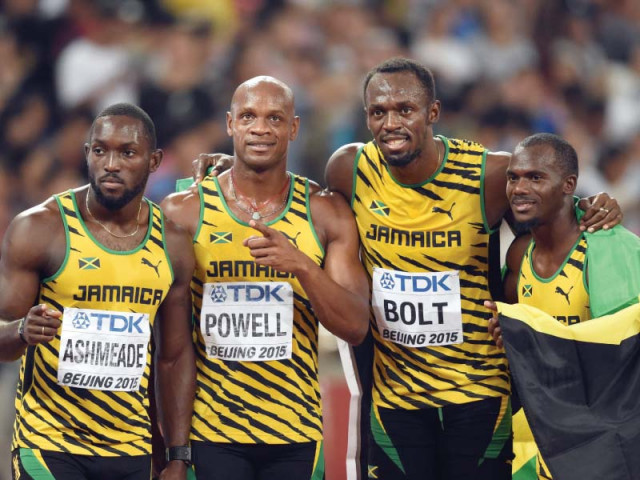 it was a record extending 11th world gold for bolt who also won three sprint titles at the 2009 and 2013 world championships photo afp