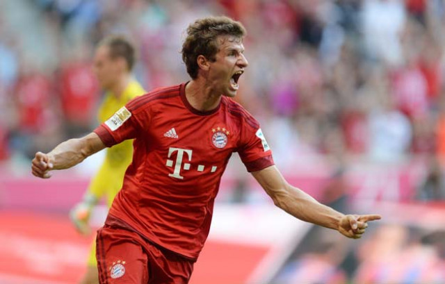bayern munich 039 s striker thomas mueller celebrates after scoring the first goal for munich during the german first division bundesliga football match bayern munich vs bayer 04 leverkusen in munich southern germany on august 29 2015 photo afp bayern munich 039 s striker thomas mueller celebrates after scoring the first goal for munich during the german first division bundesliga football match bayern munich vs bayer 04 leverkusen in munich southern germany on august 29 2015 photo afp