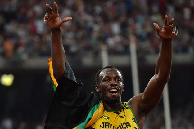 jamaica 039 s usain bolt celebrates after anchoring the jamaican team to victory in the final of the men 039 s 4x100 metres relay athletics event at the 2015 iaaf world championships at the quot bird 039 s nest quot national stadium in beijing on august 29 2015 photo afp