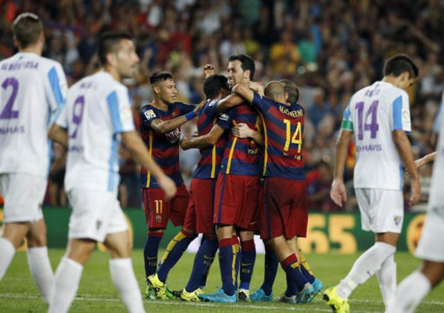 barcelona 039 s players celebrate a goal against malaga during their spanish first division soccer match at camp nou stadium in barcelona photo reuters barcelona 039 s players celebrate a goal against malaga during their spanish first division soccer match at camp nou stadium in barcelona photo reuters