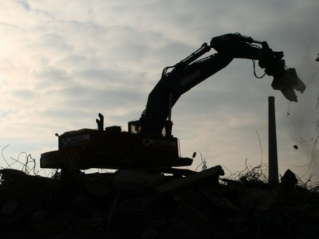 traders association says action should be taken against officials who allow these constructions photo file