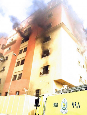 a handout picture released by the saudi press agency spa on august 30 2015 shows smoke rising from a residential complex housing of employees of oil giant saudi aramco after a fire broke out in it killing 10 people and wounding 219 on august 30 2015 in the eastern city of khobar photo afp a handout picture released by the saudi press agency spa on august 30 2015 shows smoke rising from a residential complex housing of employees of oil giant saudi aramco after a fire broke out in it killing 10 people and wounding 219 on august 30 2015 in the eastern city of khobar photo afp