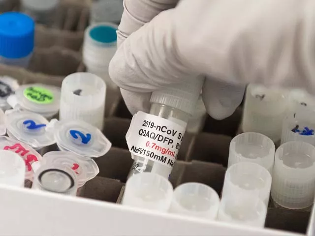 dr nita patel director of antibody discovery and vaccine development lifts a vial with a potential coronavirus vaccine photo getty dr nita patel director of antibody discovery and vaccine development lifts a vial with a potential coronavirus vaccine photo getty