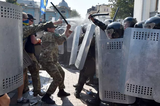 demonstrators clash with police outside the parliament building in kiev ukraine august 31 2015 photo afp demonstrators clash with police outside the parliament building in kiev ukraine august 31 2015 photo afp