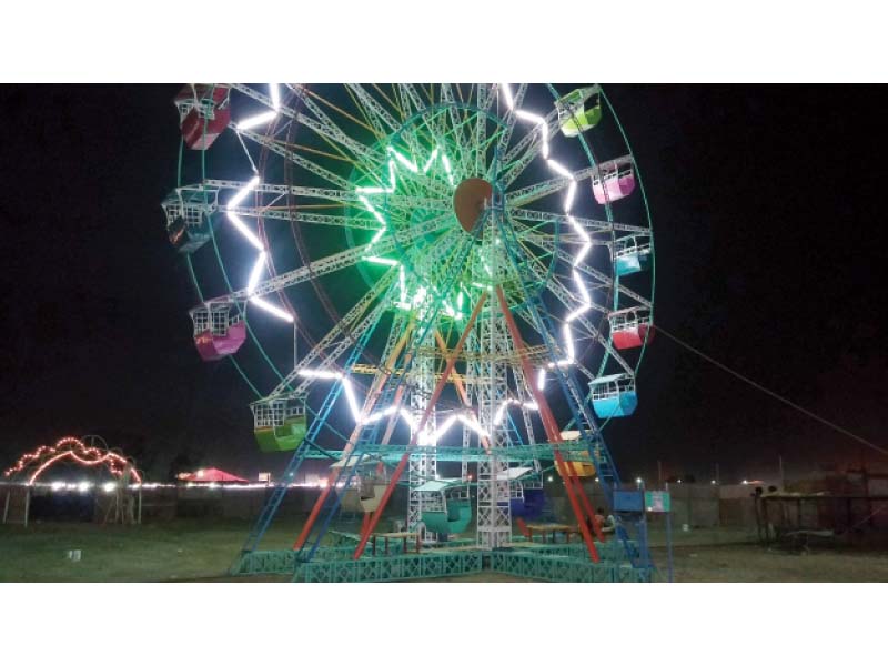 a ferris wheel has been installed at the animal market on super highway along with a shisha cafe for the people coming to buy the animals photo express