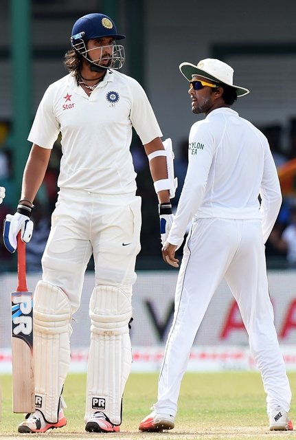 indian cricketer ishant sharma l and sri lankan cricketer dinesh chandimal exchange words during the fourth day of the third and final test cricket match between sri lanka and india photo afp