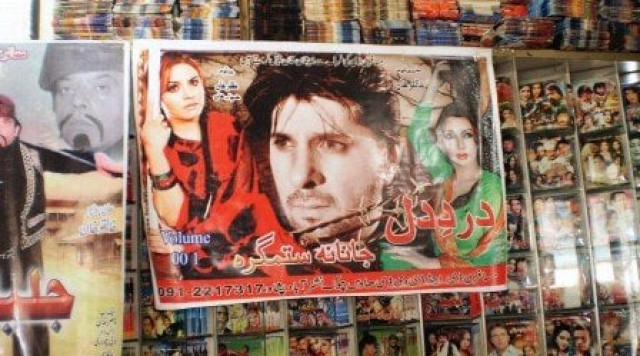 a shop in nishtarabad displays a poster of a film starring arbaaz khan photo sher alam shinwari a shop in nishtarabad displays a poster of a film starring arbaaz khan photo sher alam shinwari